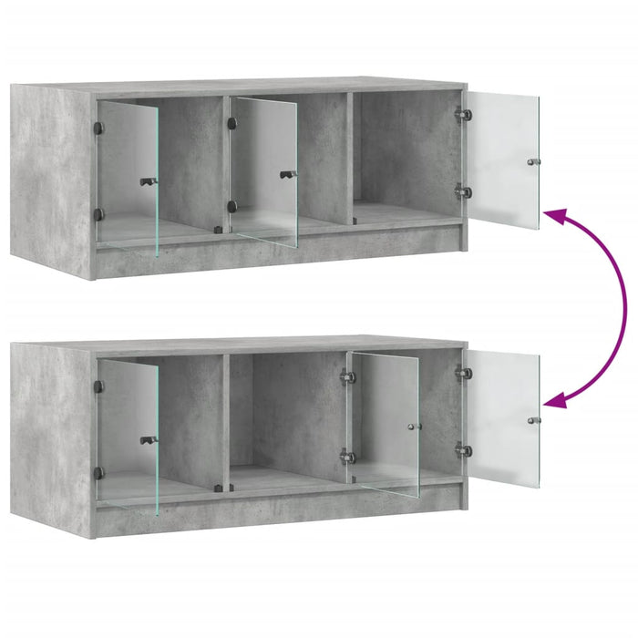 Salongbord med glassdører betonggrå 102x50x42 cm